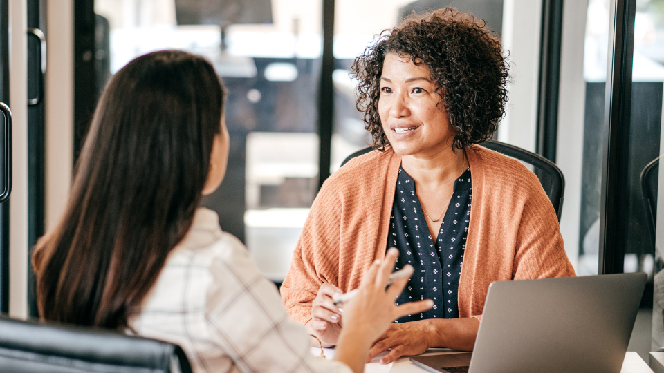 a recruiter interviewing an applicant